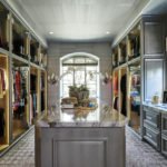 Modern Large luxury walk in closet with glass front doors
