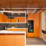 Wood and Orange Tones In Kitchen