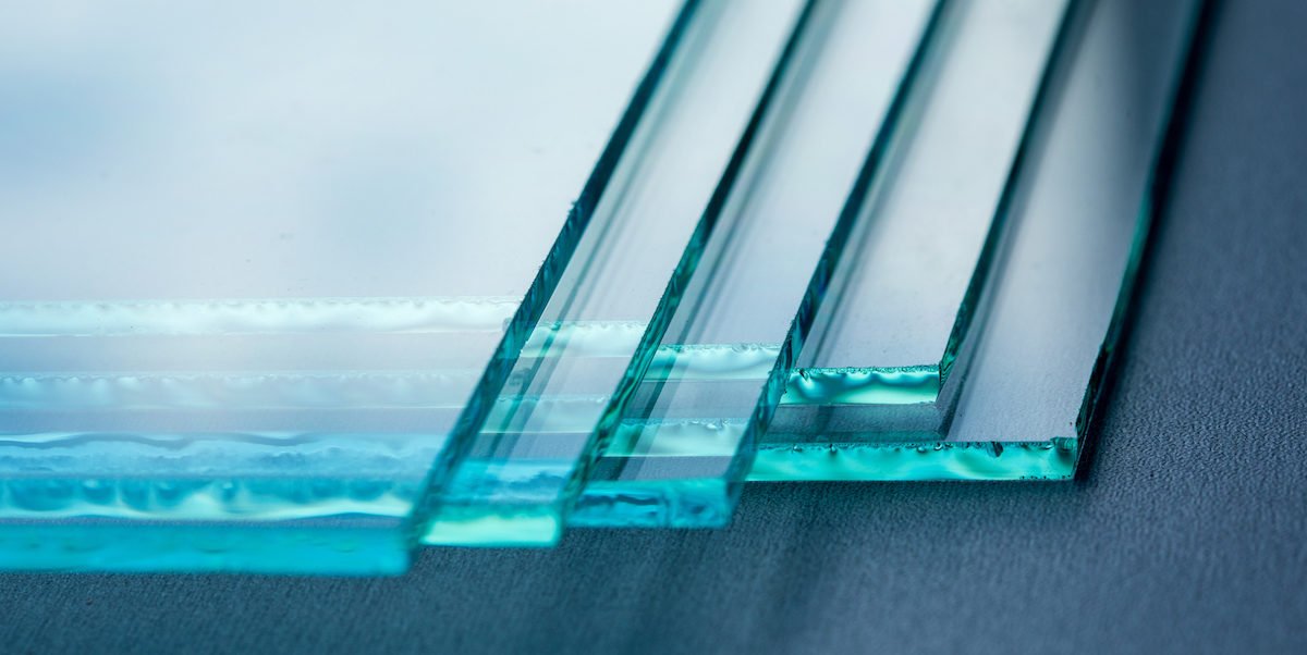 Sheets of Factory manufacturing tempered clear float glass panels cut to size